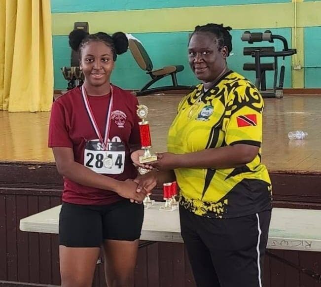 Holy Faith Convent Penal's Kayla Hospedales receives her award after topping the female category of the Secondary Schools Track and Field's South/Central 6.5K Hill Run at Rio Claro West Secondary on Octboer 24, 2024. -  Photo courtesy Rio Claro West Secondary