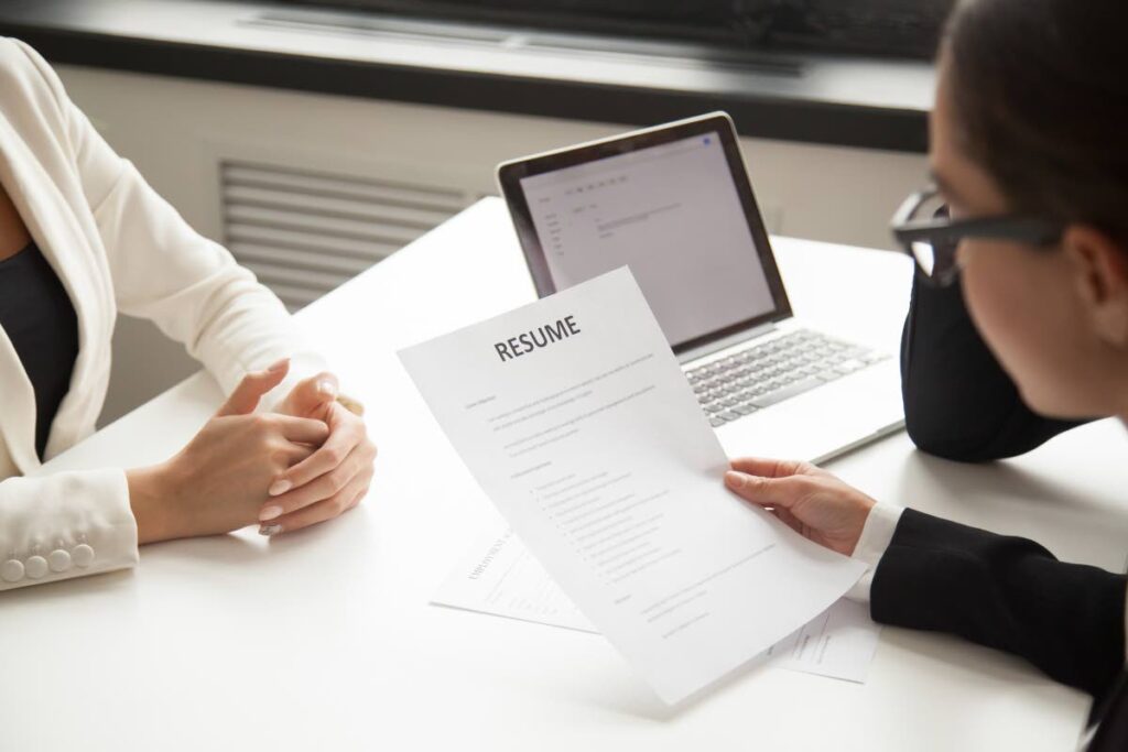 An HR manager reading an applicant’s resume during an interview.   PHOTO BY Courtesy Freepik - Courtesy Freepik