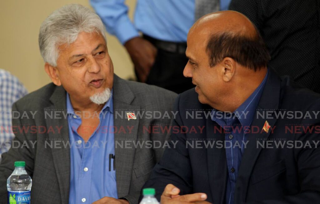 In a 2018 file photo, then UNC MP for Caroni Central Dr Bhoe Tewarie, left, in discussion with Chaguanas East MP, Fazal Karim at the Couva South constituency office, Couva - File photo by Lincoln Holder