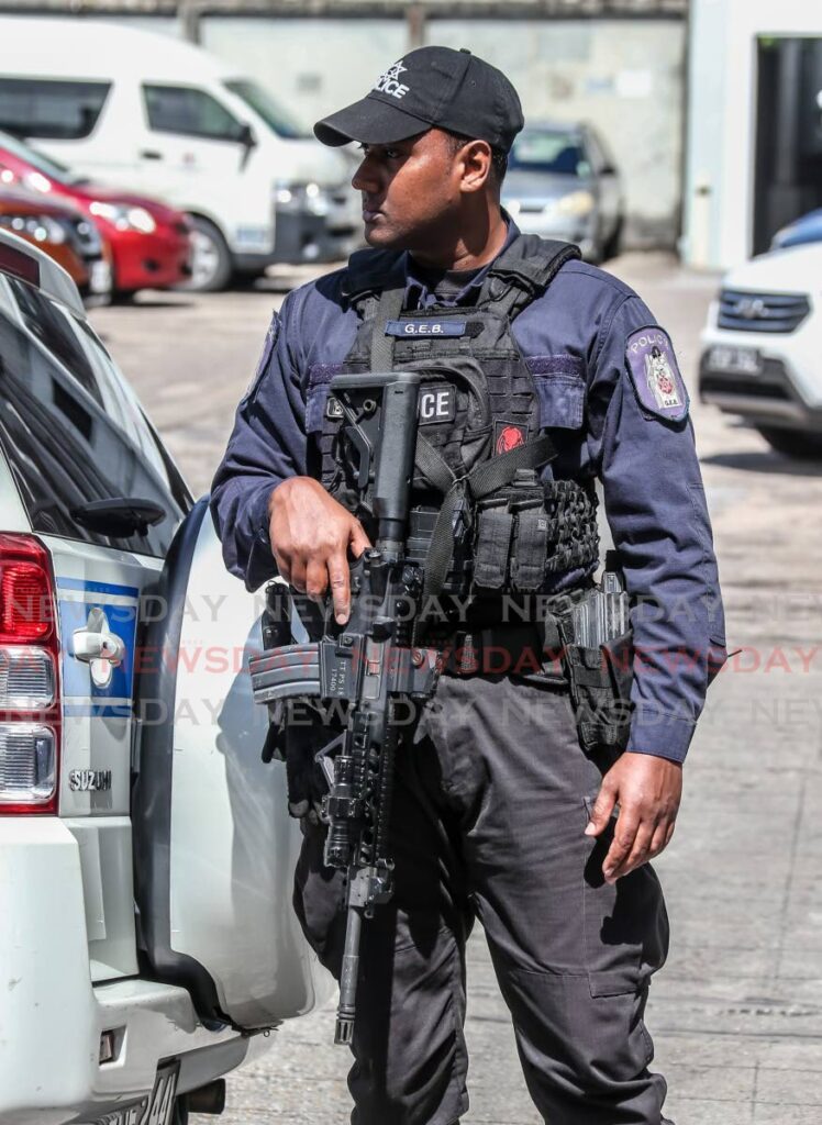 A police officer wears the standard tactical uniform that will be reserved for use by officers from Guard and Emergency Branch (GEB), Inter-Agency Task Force (IATF), National Operating Task Force and the Multi-Operational Police Section from October 18. - File photo by Jeff K. Mayers