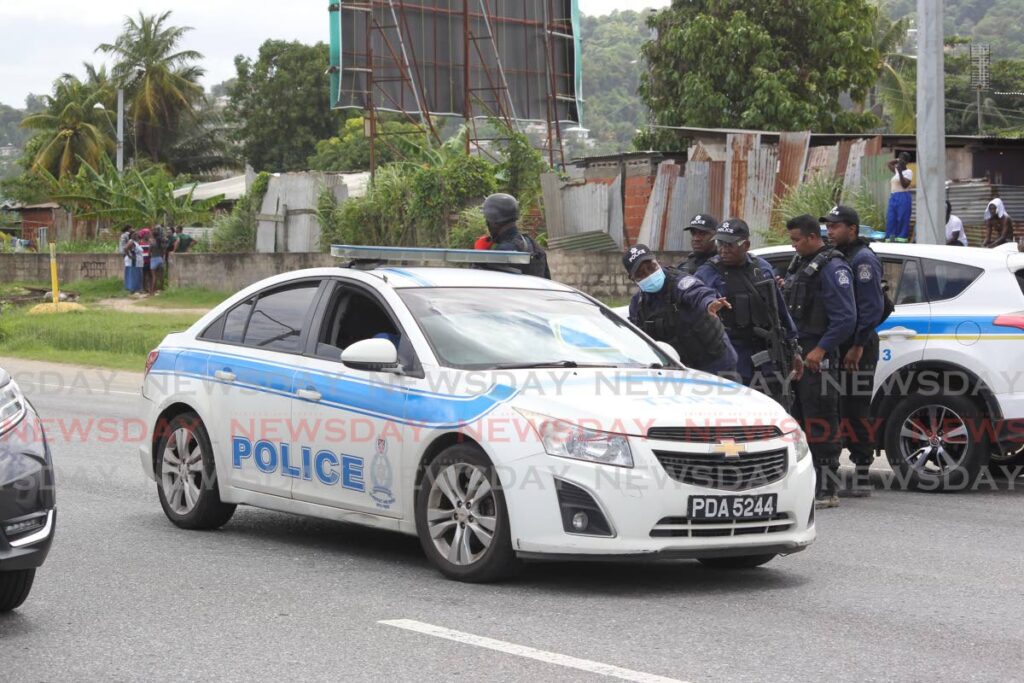 In this file photo, police officers respond to protest action by Beetham and Sea Lots residents, in Port of Spain. 



Beetham Gardens, Beetham Highway. 
Monday, July 4, 2022. - 