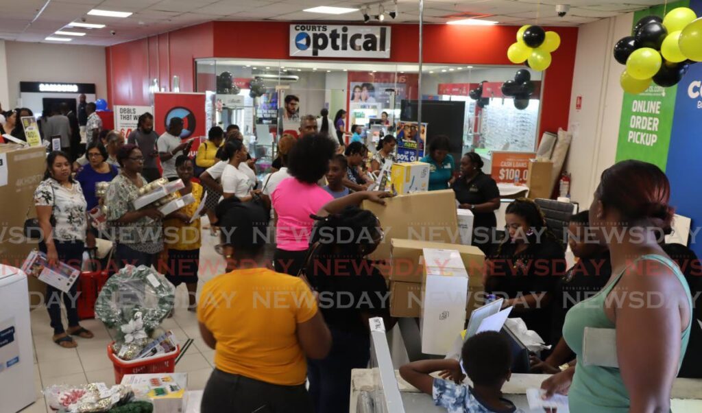 FLASHBACK: Shoppers take advantage of discounted items at the Courts Black Friday Sale event at the Courts Megastore in El Socorro in 2023. - File photo