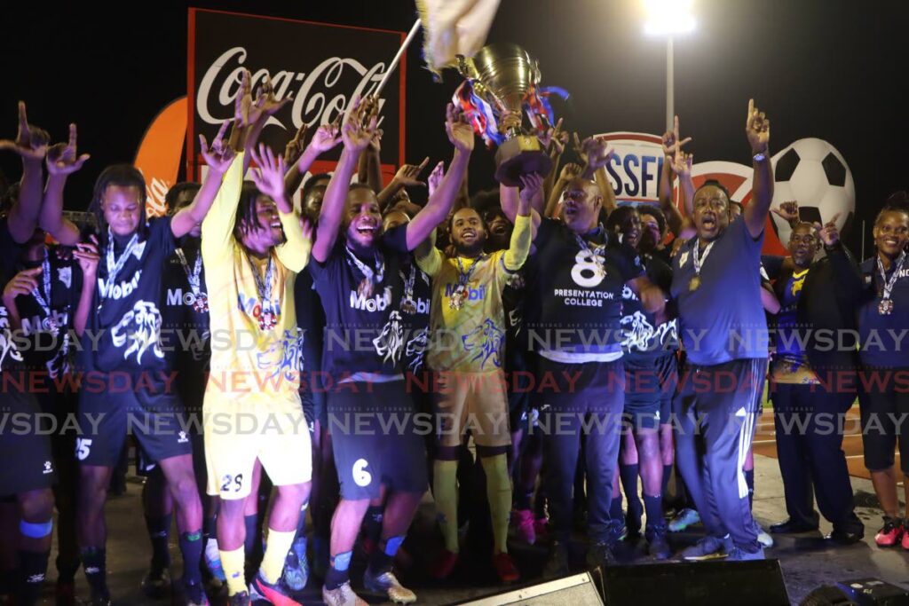 (FILE) Presentation College San Fernando players and officials celebrate winning the 2023 Coca-Cola Intercol final against St anthony’s College, on December 7, 2023, at the Hasely Crawford Stadium, Port of Spain.   - Photo by Angelo Marcelle