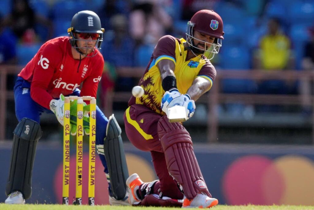 West Indies' Nicholas Pooran hits a six against England in a 2023 T20 series at the National Cricket Stadium in Saint George's, Grenada. FILE PHOTO - 