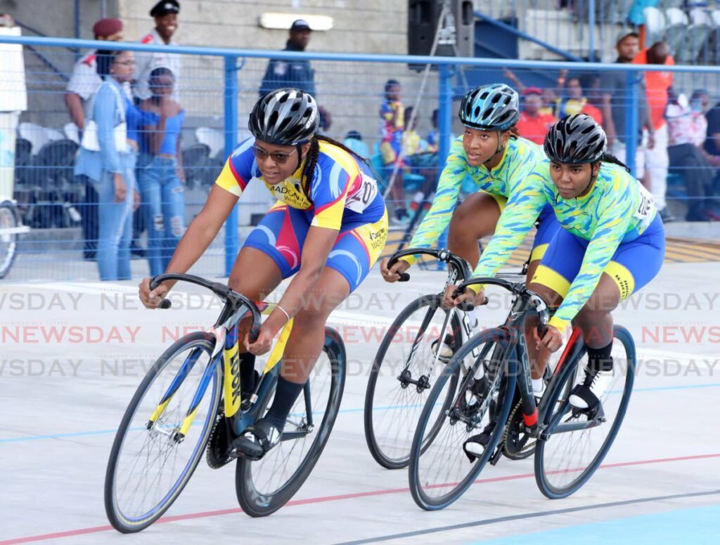 In this March 17 file photo, Phoebe Sandy ,front, finishes first in the elite women’s 500 meters during the Southern Games, Skinner Park, San Fernando.  - AYANNA KINSALE