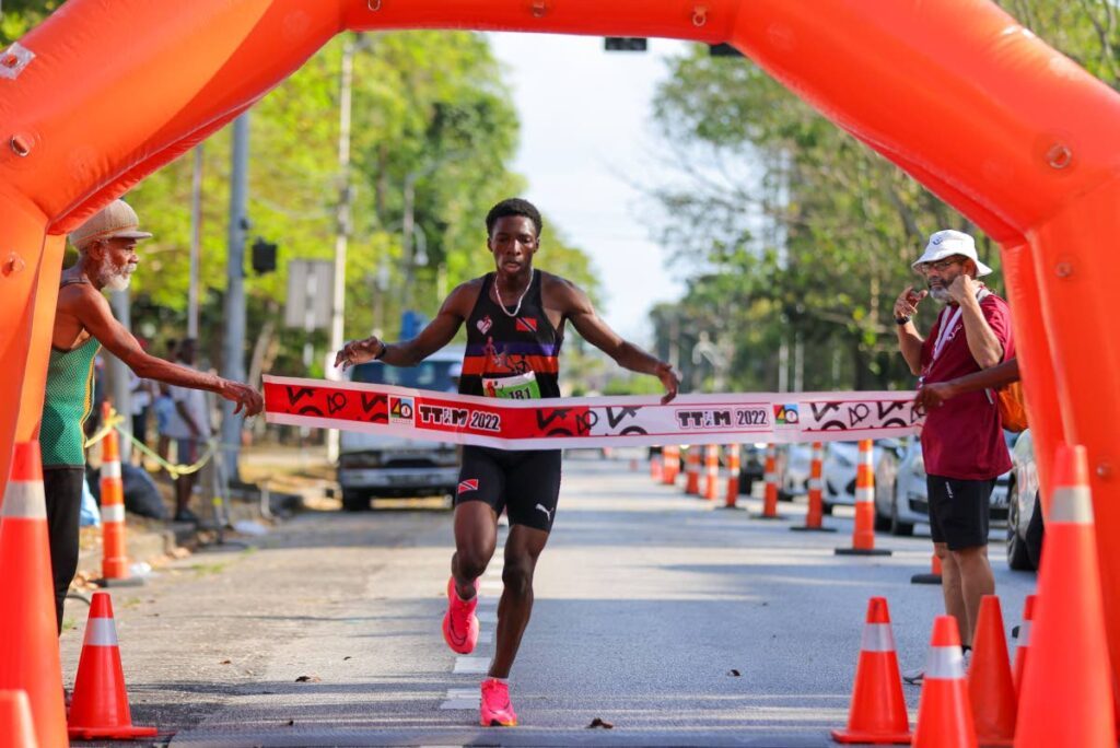 In this March 23, 2023 file photo, Omare Thompson finishes first in the TTIM 5K overall male event at the Queen’s Park Savannah in Port of Spain. - Photo by Daniel Prentice