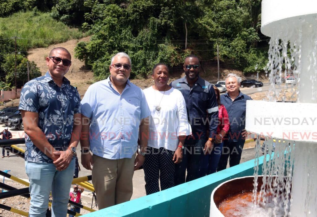 Water and Sewerage Authority’s (WASA) acting CEO Kelvin Romain, from left, chairman Ravi Nanga, Minister of Planning and Development Pennelope Beckles, Minister of Public Utilities Marvin Gonzales, acting director of operations Shaira Ali, partially hidden, and Minister of Finance and MP for Diego Martin North/East Colm Imbert at the commissioning ceremony of the New Saut D'eau Water Treatment Facility on Saut D'eau Road, Maraval on October 26. - Photo by Faith Ayoung