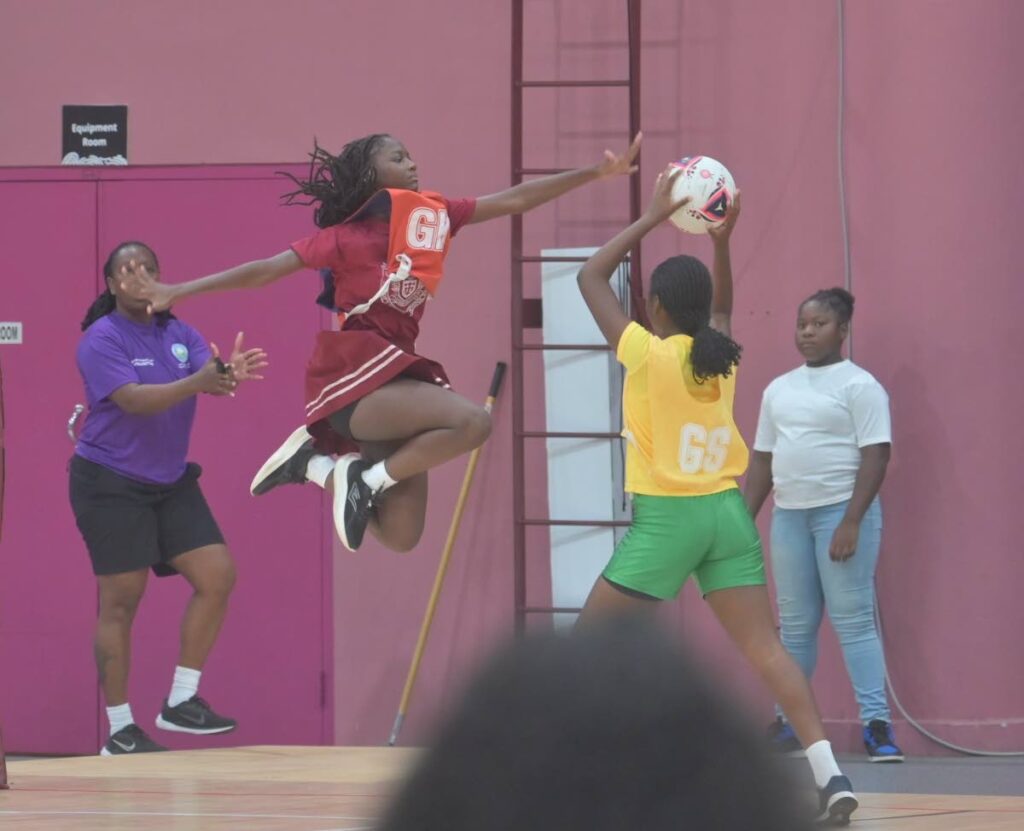 A Bishop's High player jumps to defend against Signal Hill Secondary in the under-13 final of the Tobago Secondary Schools Netball League at Shaw Park, October 30. - Photo courtesy Visual Styles