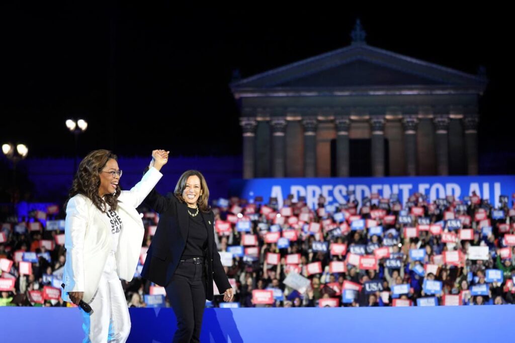 Oprah Winfrey, left, walks with Democratic presidential nominee Vice President Kamala Harris during a campaign rally outside the Philadelphia Museum of Art, on November 4, in Philadelphia.  - AP PHOTO