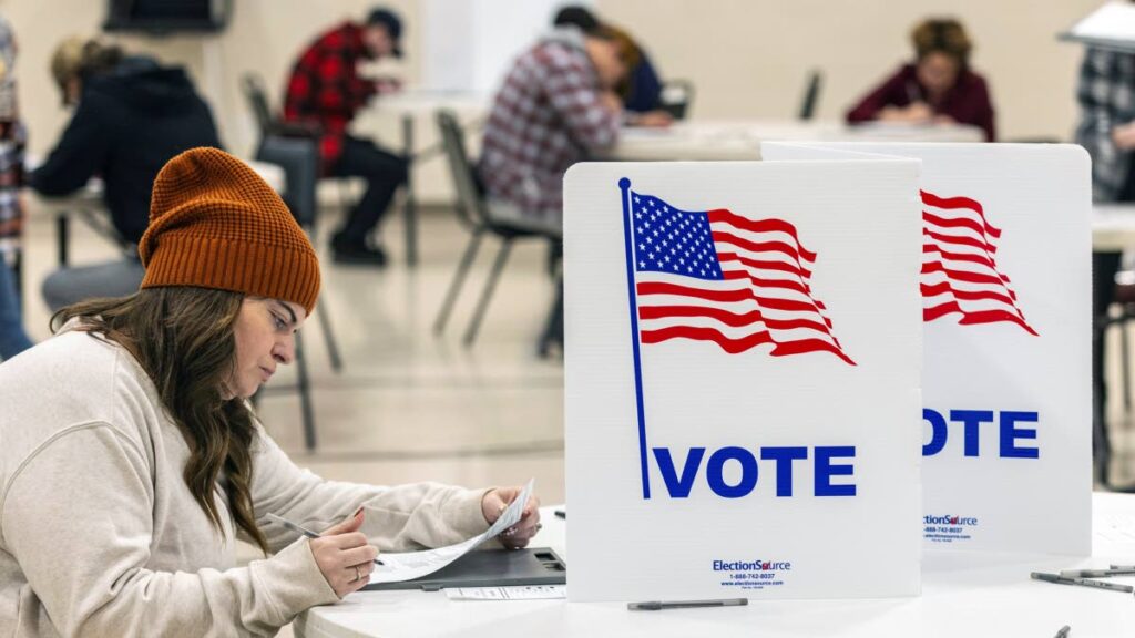 Kortney Test fills out her ballot at Celebration Covenant Church in Omaha, Nebraska, on Election Day, November 5. - AP PHOTO 