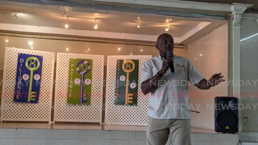 Garth St Clair delivers a speech at the En ToTo Keys To Success youth empowerment symposium held at the Lions Cultural Centre, Woodbrook on November 5. - Photo by Mya Quamie