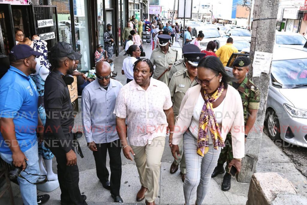 Minister in the Ministry of National Security Keith Scotland on a walkabout on High Street, San Fernando, on November 8.  - Photo by Lincoln Holder 