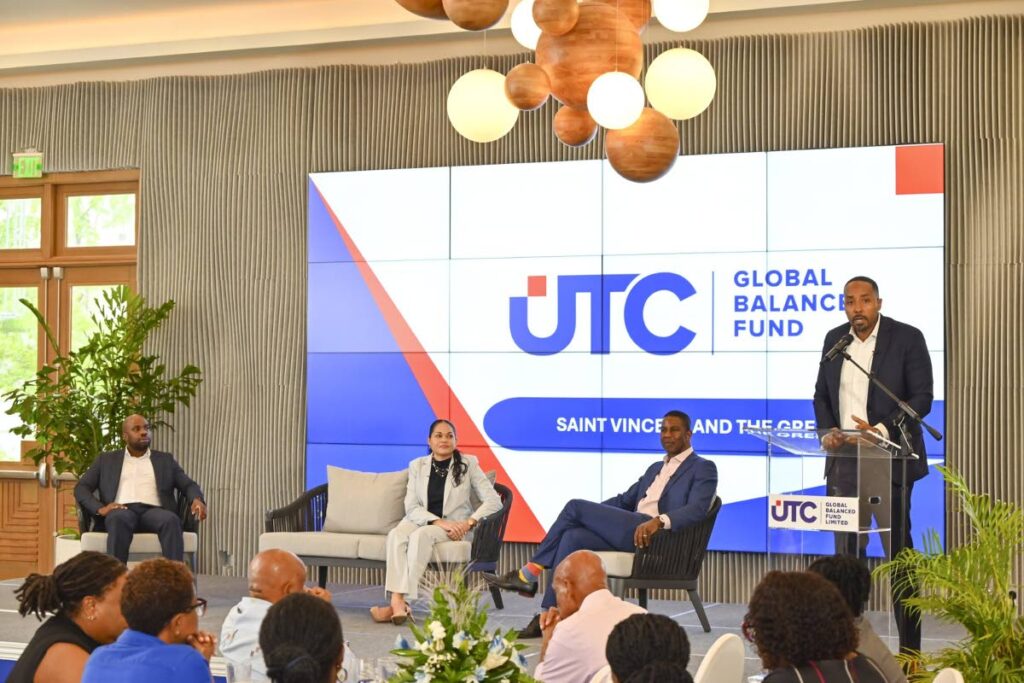 TTUTC executive director Nigel Edwards, third from right, listens to a question from the audience as part of a panel during the launch of UTC GBFL in St Vincent and the Grenadines at Sandals. From left, are Deyson Scott, chief sales and marketing officer, TTUTC, Crystal Rodgriguez-Greaves, chief investment officer, TTUTC and Omar Burch Smith, regional CIS manager, UTC Fund Management Services. - 