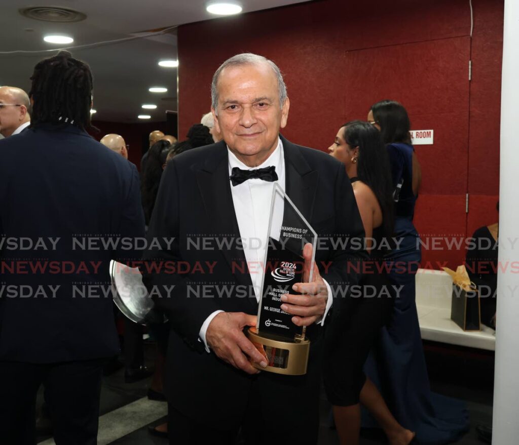 George Janoura, chairman and managing director of Janouras Custom Design Ltd at the Champions of Business awards on November 7. - Photo by Faith Ayoung