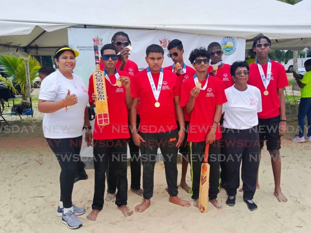 Lady Hochoy Penal celebrate after winning the beach cricket competition at the inaugural Special Olympics Caribbean Initiative Regional Beach Games on day one action  at Maracas Bay on November 9. - Photo by Jonathan Ramnanansingh