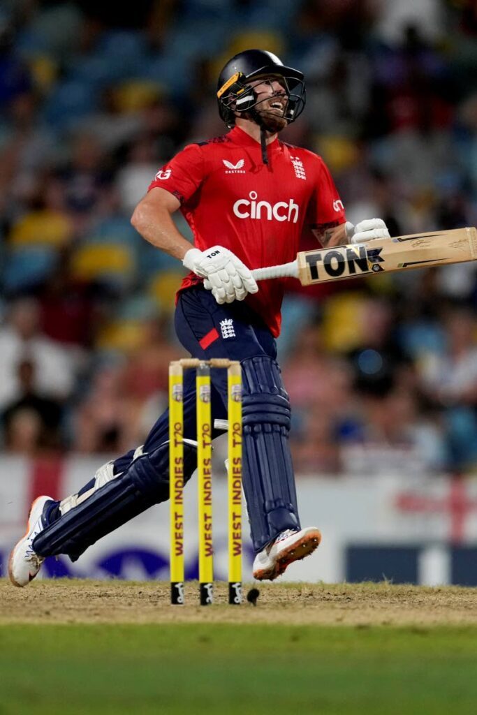 England’s Phil Salt celebrates scoring a century against West Indies during the first T20 at Kensington Oval in Bridgetown, Barbados, on November. 9. - AP PHOTO