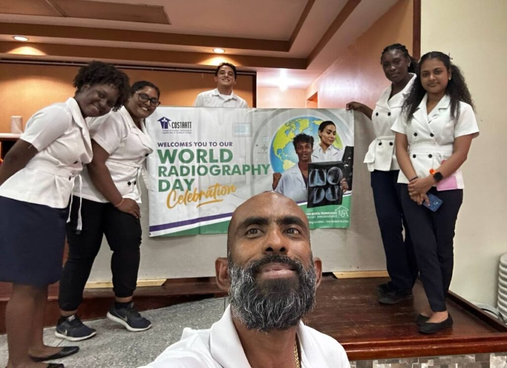 Students from COSTAATT's radiography programme  with Mobile Medical Global CEO David Richards at the World Radiography Day event. - Mobile Medical Global