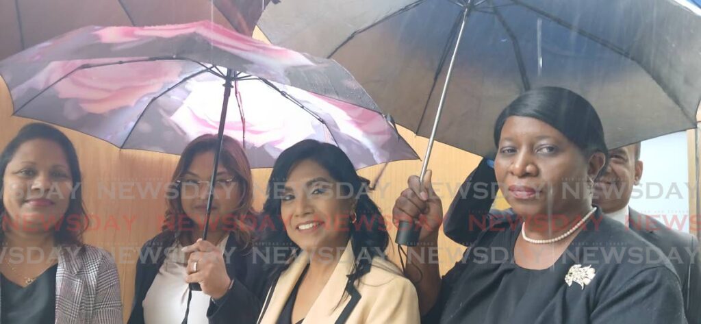 Auditor General Jaiwantie Ramdass, second right, leaves Cabildo Chambers, Port of Spain, with colleagues on November 13 after the Public Accounts Committee cancelled a hearing on the public accounts of TT. - Photo by Sean Douglas