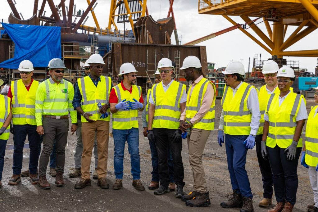 From left, George Vieira, managing director EOG Resources Trinidad Ltd; Javed Mohammed, general manager, Trinidad Offshore Fabricators Unlimited (TOFCO); Prime Minister Dr Keith Rowley; Minister of Energy and Energy Industries Stuart Young; bpTT president David Campbell; Member of Parliament for Point Fortin Kennedy Richards and
Kazim Hosein, Minister of Agriculture, Land and Fisheries at the TOFCO fabrication yard, La Brea on November 13.
 - Photo courtest bpTT