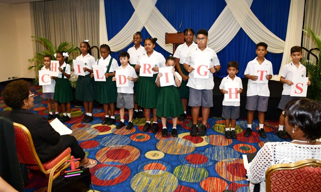 Students of St Monica’s Preparatory School perform a poem on child Rights at the conference on November 13. - ORRSOMEPHOTOGRAPHY