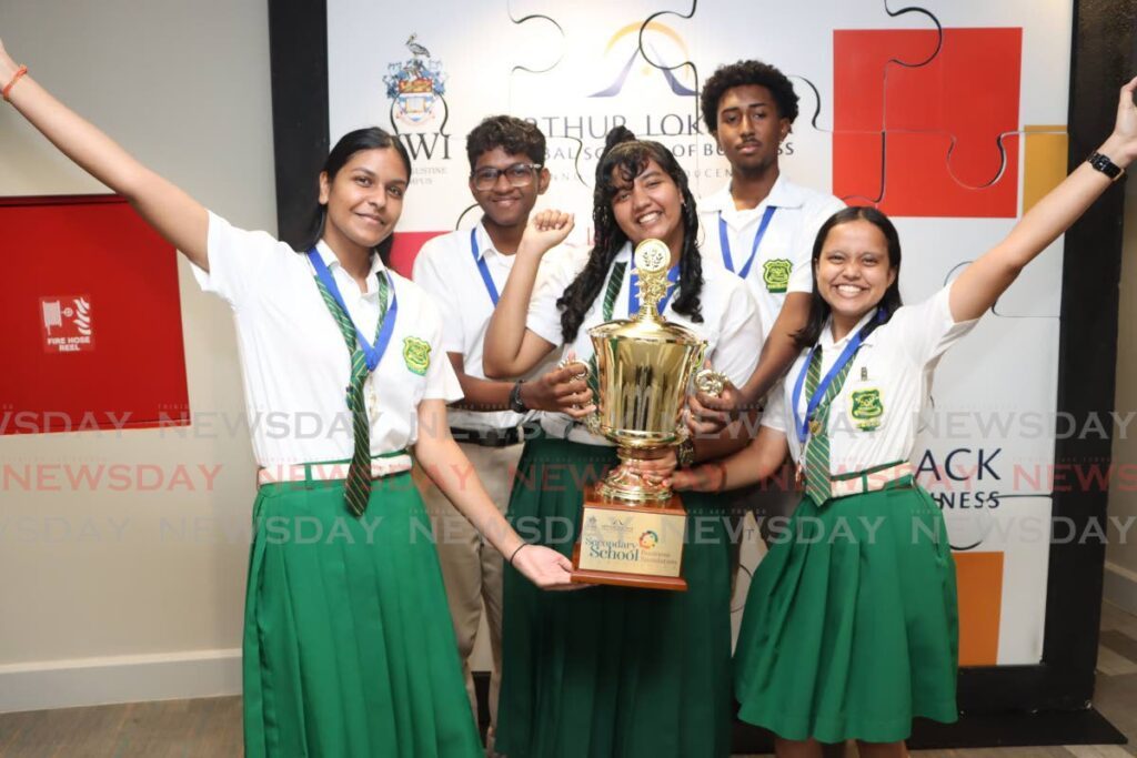 FIRST PLACE WINNERS: Couva East Secondary School cops first place for the Secondary School Business Simulation Competition 
Sandrina Deo, left,  André Ali Bocas, Skye Craig, Jaron Metivier and Alexandra Hosein at the Arthur Lok Jack Global School of Business, Mt Hope on November 15.  - Photo by Angelo Marcelle