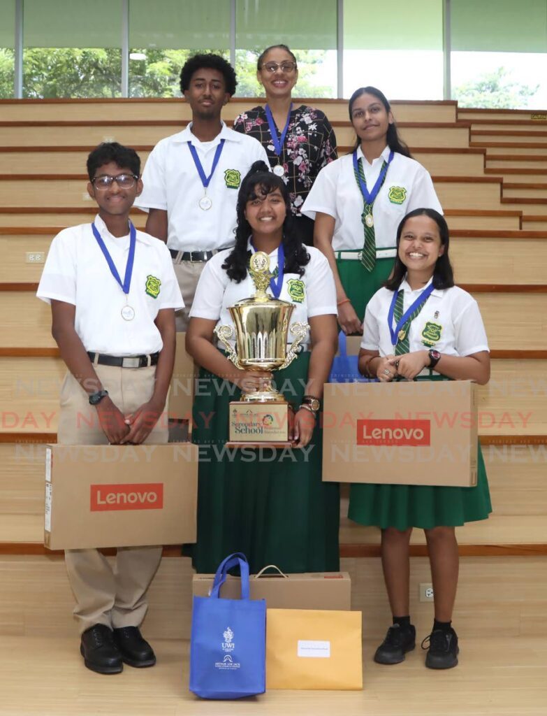 Secondary School Business Simulation Competition winners Couva East Secondary School. From left, bottom row, Andre Ali Bocas, Skye Craig and Alexandra Hosein. From left, top row, Jaron Metivier, MOB/POB teacher Lisa Nagassar and Sandrina Deo, centre, at the Arthur Lok Jack Global School of Business, Mt Hope on November 15. - Photo by Angelo Marcelle