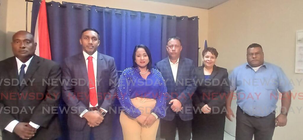 National Transformation Alliance (NTA) political leader Gary Griffith, third right, with five of the six potential candidates announced for constituencies on November 16 at NTA head office in Mt Lambert. They are, from left, Jairzinho Rigsby, Dr Kevin Sarran, Savita Pierre, Christine Newallo-Hosein and Bernie Maharaj. Missing is Paul Daniel Nahous. 
 - Photo by Sean Douglas