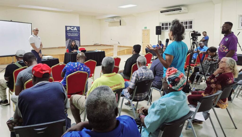 PCA director David West, far left, receives feedback from a member of the audience during a meeting in Canaan, Tobago on November 14. - Photo courtesy PCA