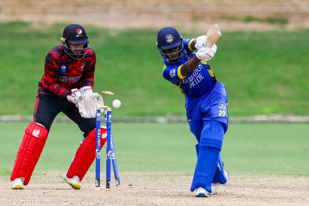 Barbados Pride Leniko Boucher is bowled by TT Red Force's Mark Deyal (not in frame) while wicketkeeper Amir Jangoo looks on during the CWI Regional Super 50 tournament match at the Queen’s Park Oval, St Clair on November 16. - DANIEL PRENTICE