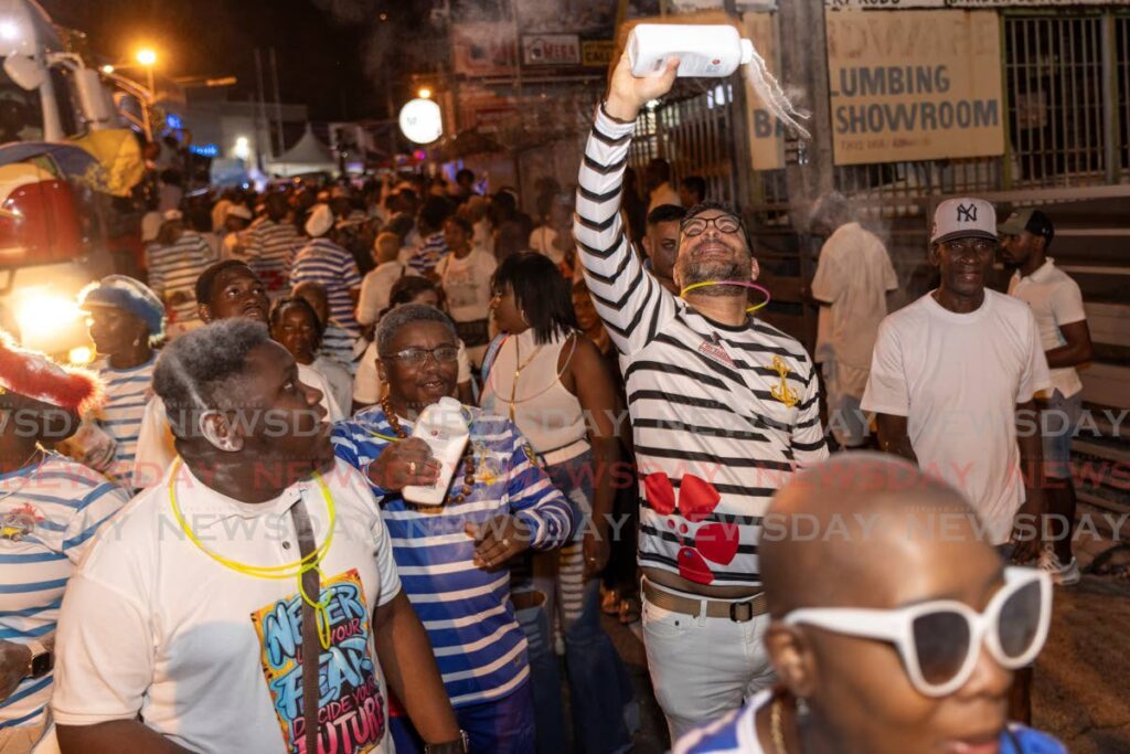 Minister of Tourism Randall Mitchell at the Steelpan and Powder parade, San Fernando. - Photos by Jeff K Mayers