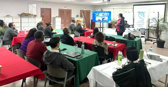 Participants at the Sensitisation Session listen attentively during the presentation by Dr. Michelle Cazabon-Mannette of SpeSeas and SOS Tobago. - 