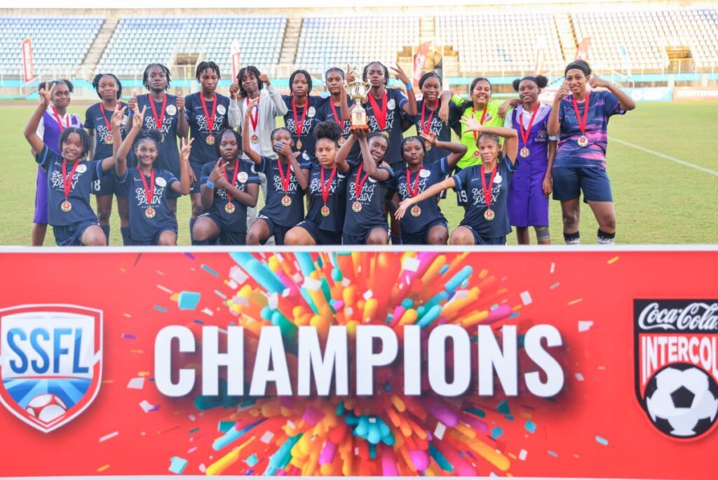 Miracle Ministries celebrate their victory against Holy Faith Convent Couva during the SSFL Coca-Cola Intercol Girls' Central Zone final at the Ato Boldon Stadium on November 18, in Balmain, Couva. - Photo by Daniel Prentice 