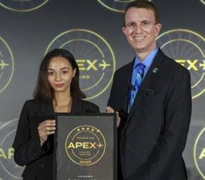 Christina de Sousa Caribbean Airlines Manager, Customer Attention, accepts Airline Passenger Experience Association (APEX) Four Star Major Airline rating for 2024 award on behalf of the airline. - 