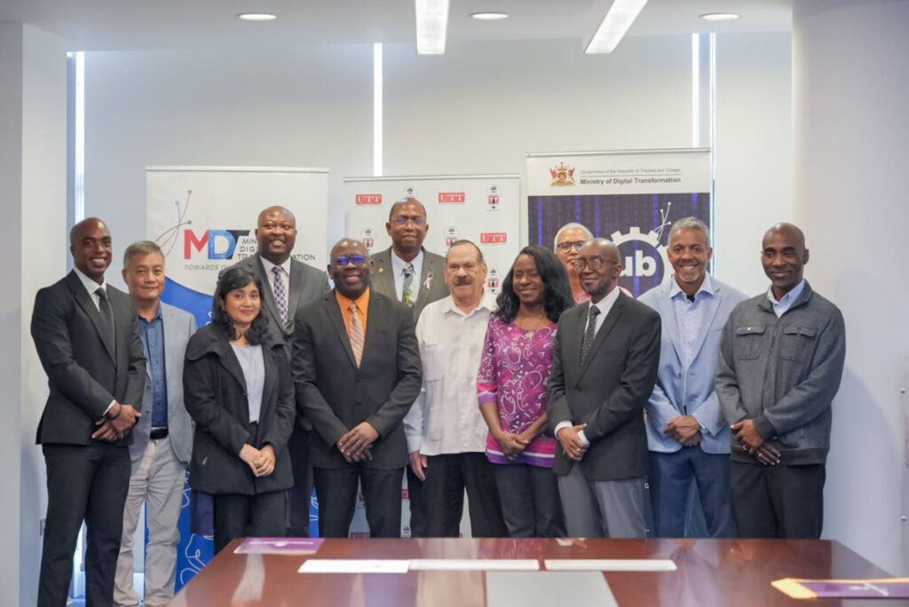 Stakeholders from the Ministry of Digital Transformation and the UTT after a memorandum of understanding between the two organisations was signed to advance cyber-security training and collaboration at UTT's Tamana Campus on October 24. In photo are, front row from left, Sasha Ali-Khan, Prof Stephen Joseph, Prof Clément Imbert, Dr Solange Kelly, Dayle Connelly, back row from left, Charles Bobb-Semple, Prof Yufei Wu, Cory Belfon, Dorwin Manzano, Albert Chow, Wayne Nakhid, and Allan Nelson. - 