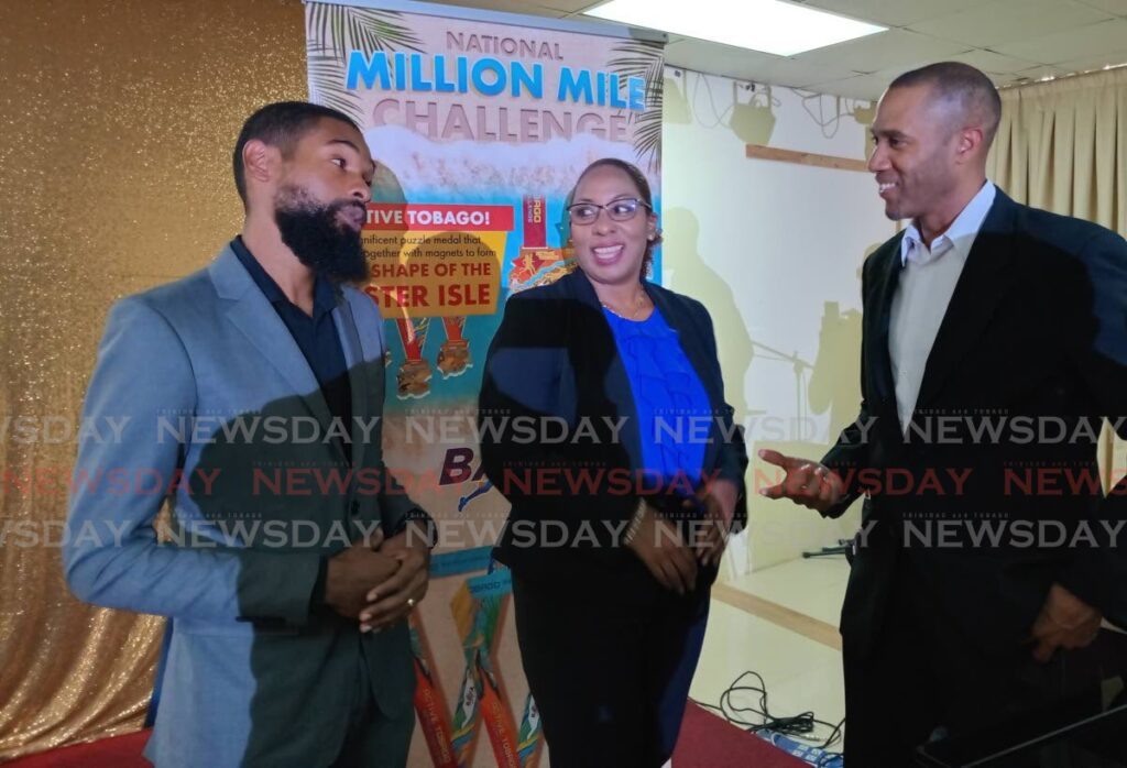 President of Bafasports Nigel Bellamy, right, has a chat with one of TT's top marathon runners Colin Perreira, left, and fitness enthusiast Nicole Murrell.  -  Photo by Jelani Beckles