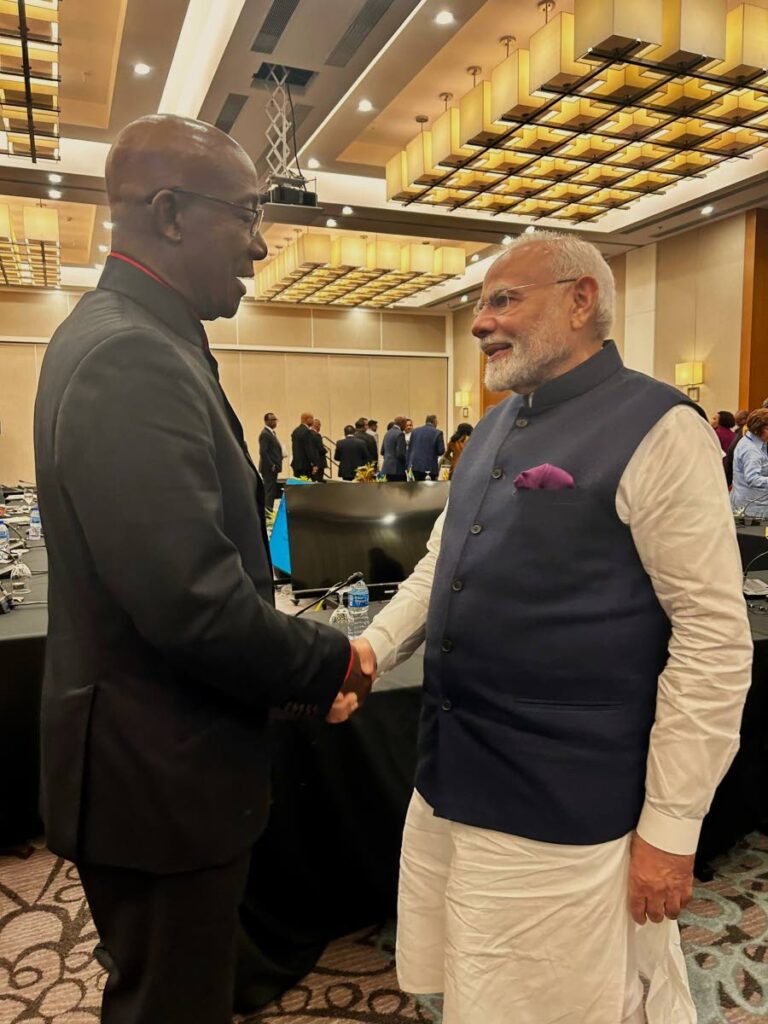 GREETINGS: Prime Minister Dr Keith Rowley greets India's Prime Minister Narendra Modi during the Caricom-India Summit on November 20 in Georgetown, Guyana. - Photo courtesy Office of the Prime Minister