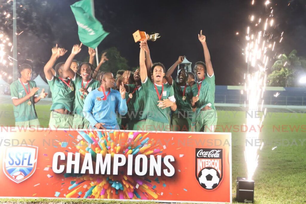 San Juan North Secondary players celebtare after beating Trinity College East in the Coca-Cola East Zone intercol final, at the Arima Velodrome, on November 20.  - Ayanna Kinsale