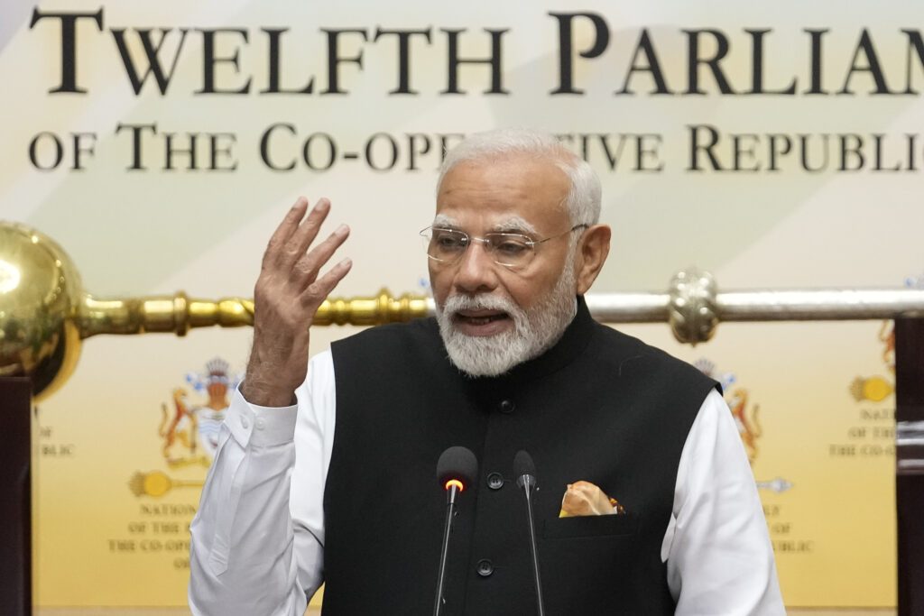 India's Prime Minister Narendra Modi addresses members of Parliament, in Georgetown, Guyana, November 21. - AP PHOTO