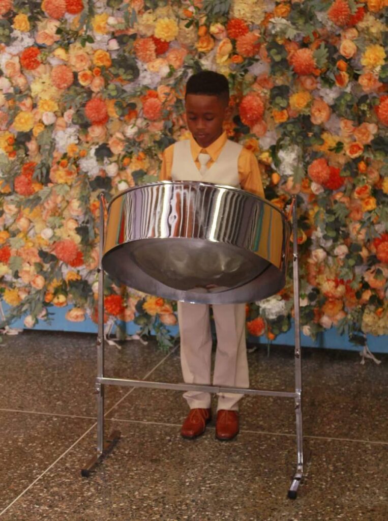 Jadon Mollineaux plays the steelpan. - 