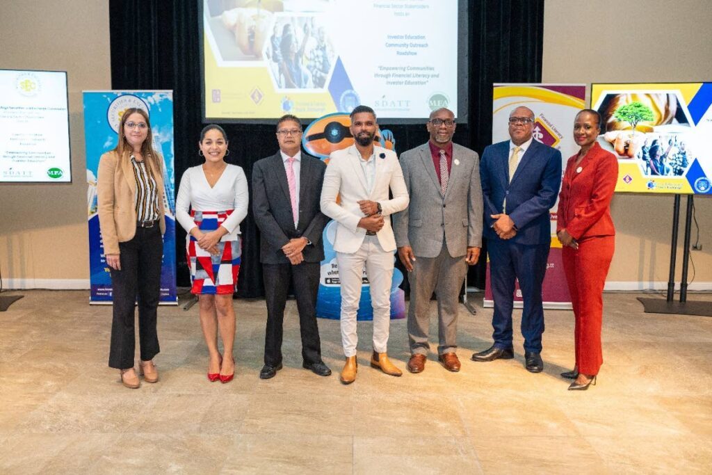 From left, President of the Mutual Fund Association Alesha Phelps, president of the Securities Dealers Association Tiffany Pemberton Marquez, Securities and Exchange Commission CEO Imtiaz Hosein, Chaguanas mayor Faaiq Mohammed, the commission's CEO Kester Guy, Financial Services Ombudsman Dominic Stoddard and the commission's manager of corporate communications and education Ellen Lewis. - Photo courtesy the SEC