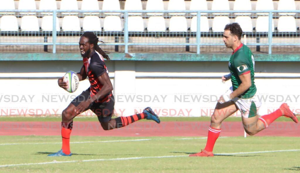 Agboola Silverthorn of TT scores a try against Mexico at the Larry Gomes Stadium, Arima on November 22. - Photo by Angelo Marcelle