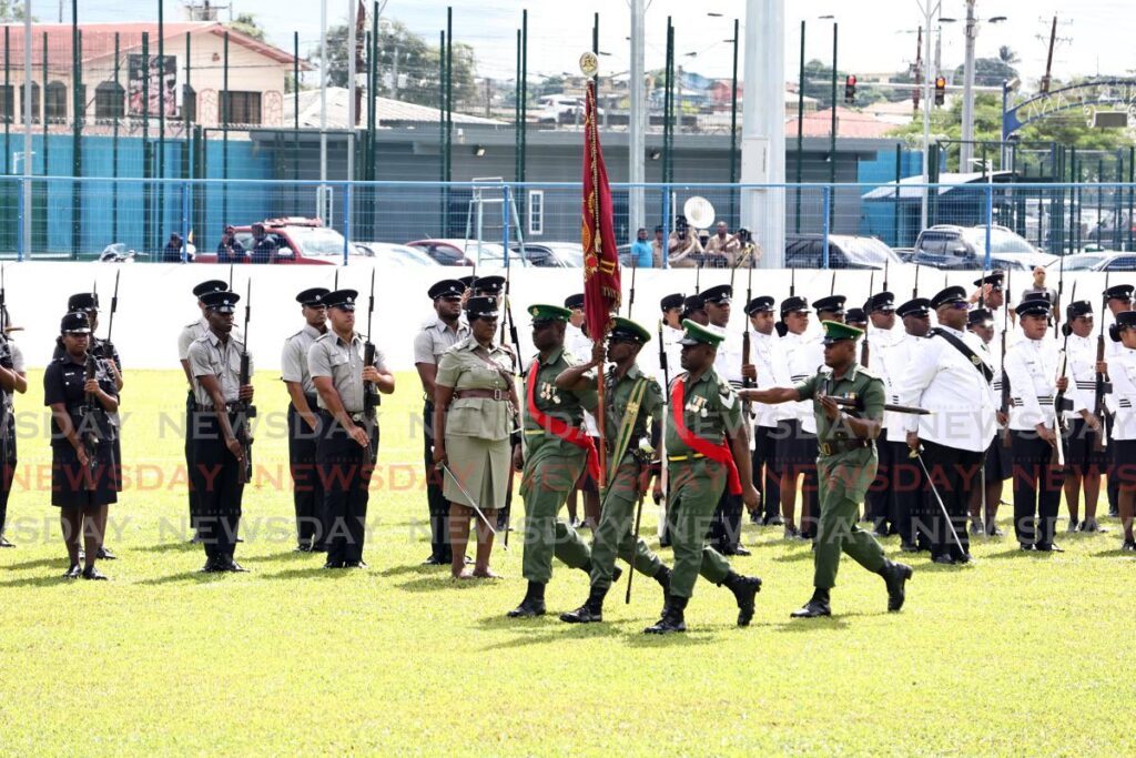 Members of the Trinidad and Tobago Defence Force arrive at Skinner Park, San Fernando to start the military parade in commemoration of San Fernando's 36th anniversary on November 23. - Photo by Lincoln Holder