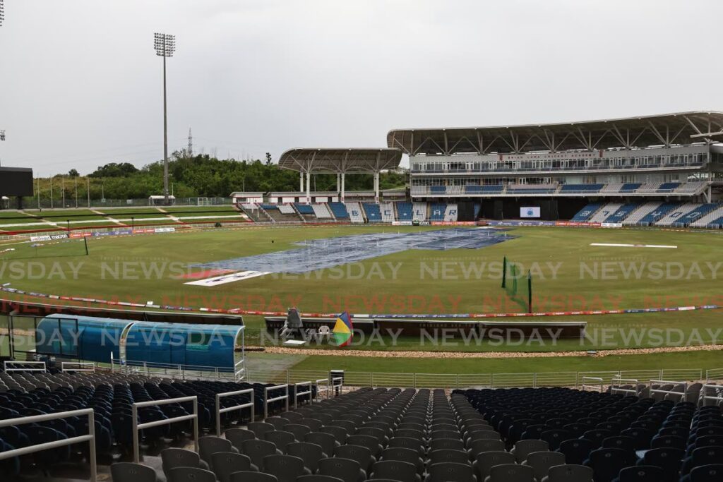 The covers remain as rain delays the start of the final of the CG United Super 50 Cup between Barbados Pride and Jamaica Scorpions at the Brian Lara Cricket Academy, Tarouba, on November 23. - Photo by Lincoln Holder 