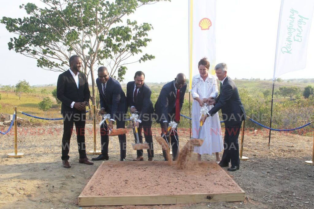 Minister of Public Utilities, Marvin Gonzales, left; Eugene Okpere, senior VP and country chair, Shell TT; Energy Minister Stuart Young; Prime Minister Dr Keith Rowley; Anja-Isabel Dotzenrath, VP bpTT; and David Campbell, president bpTT; turn the sod for the Brechin Castle solar site in Couva. - File photo by Lincoln Holder