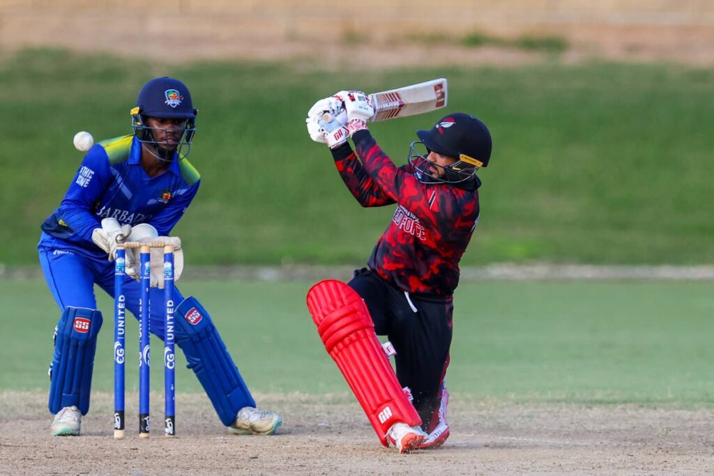 In this November 16, 2024 file photo, Trinidad and Tobago Red Force’s wicketkeeper/batsman Amir Jangoo tries a sweep shot while Barbados Pride Leniko Boucher looks on during the CWI Regional Super50 tournament match at the Queen’s Park Oval, St Clair.  - Photo courtesy Daniel Prentice