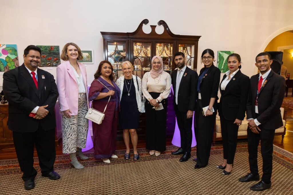 British High Commissioner Harriet Cross, second left, with guests at the event to to mark the commencement of 16 Days of Activism Against Gender-Based Violence.
 - 