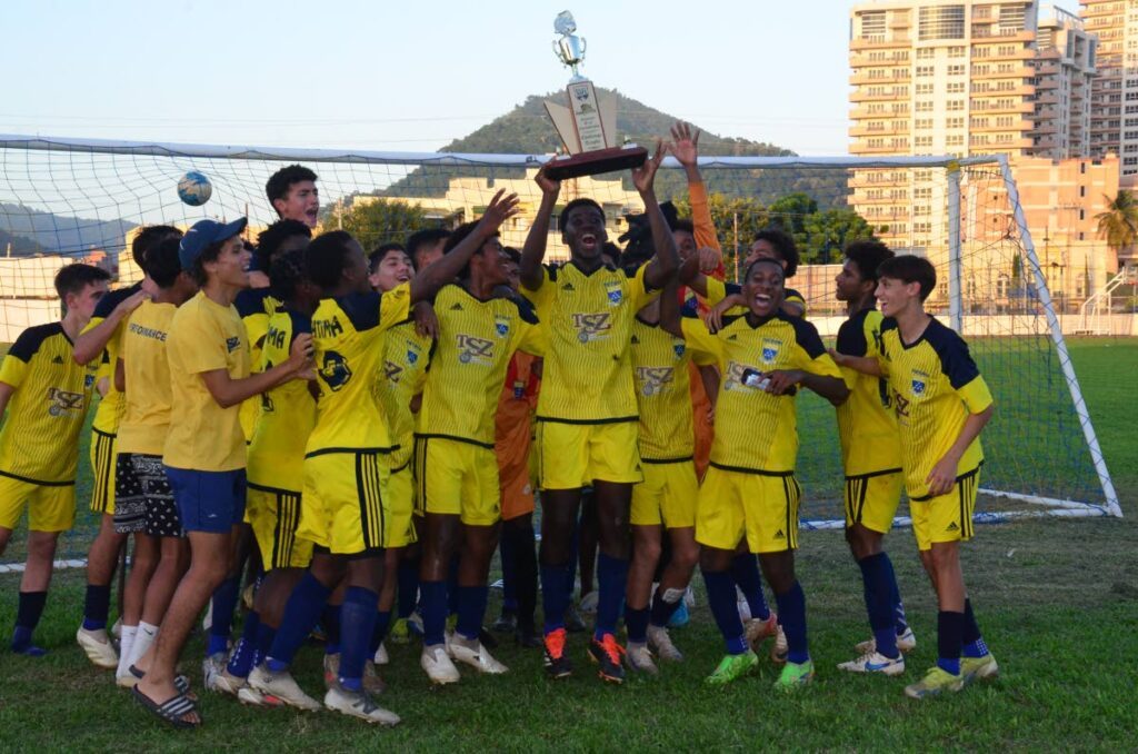 Fatima College’s Under-16 football team celebrates after beating Signal Hill 1-0 in the SSFL national under-16 final, on December 1, at Fatima Grounds, Mucurapo.  - Photo courtesy Ronald Daniel