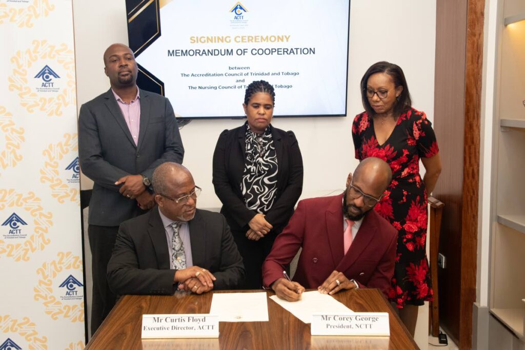 From left, TTRNA president Idi Stewart, acting Permanent Secretary in the Ministry of Education Simone Williams, and ACTT chairman Dr Ruby S Alleyne observe the signing of the Memorandum of Co-operation by ACTT executive director Curtis Floyd,  and NCTT president Corey George.  -