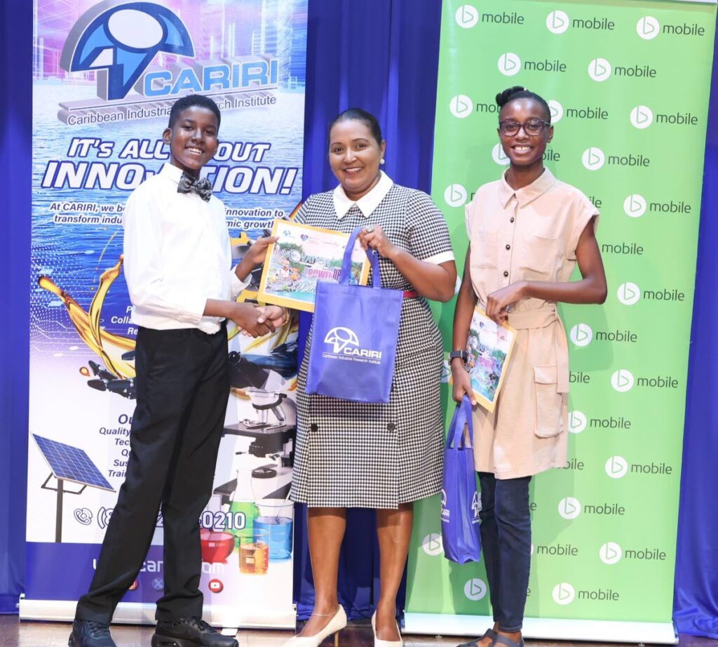 Anjanie Ramesar-Soom of bmobile, centre, congratulates the young innovators, Davis and Richardson, for their achievements at Cariri's PowerUp competition. Photo courtesy bmobile - 