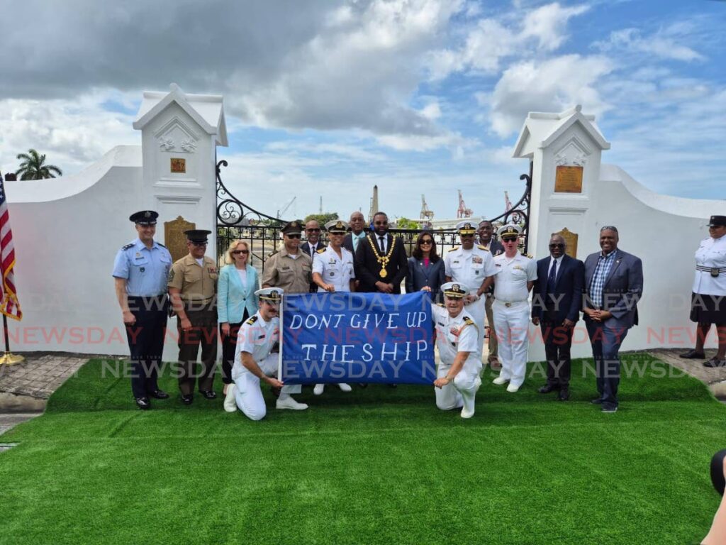 US Southern Command (Southcom) US Navy Admiral Alvin Holsey, PoS mayor Chinua Alleyne and US Ambassador Candace Bond, along with other members of the US Navy and the Pos Spain City Council at the Admiral Oliver Hazard Perry gate at the Lapeyrouse Cemetery on Tragarete Road after the ribbon-cutting on December 10, 2024. - Photo by Paula Lindo